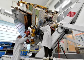 Thales Alenia space's engineers work on Eutelsat's KONNECT Satellite / Source: Yann Coatsaliou/AFP/Getty Images