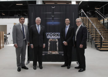 York Space Systems executives and Department of Defense officials touring York's new manufacturing facility. / Source: York Space Systems