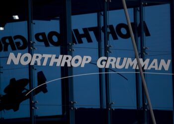 The Northrop Grumman Corp. booth stands at the Singapore Airshow held at the Changi Exhibition Centre in Singapore, on Tuesday, Feb. 11, 2014. The air show takes place from Feb. 11-16. Photographer: Brent Lewin/Bloomberg