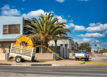 Fiber optic cables being installed in a tropical location (Photo/Canva)