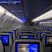 Entertainment screens are seen in the economy cabin on an Airbus SE A321 Neo aircraft, operated by United Airlines, following a news conference at George Bush Intercontinental Airport in Houston, Texas on Nov. 30, 2023. (Courtesy/Callaghan O'Hare/Bloomberg)